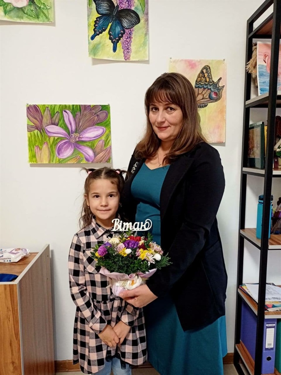 Разом зі своєю ученицею Тамілою